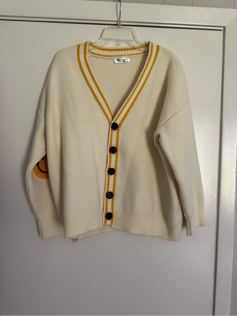 Cream V‑Neck Cardigan with Yellow Trim and Smiley Elbow Patch
